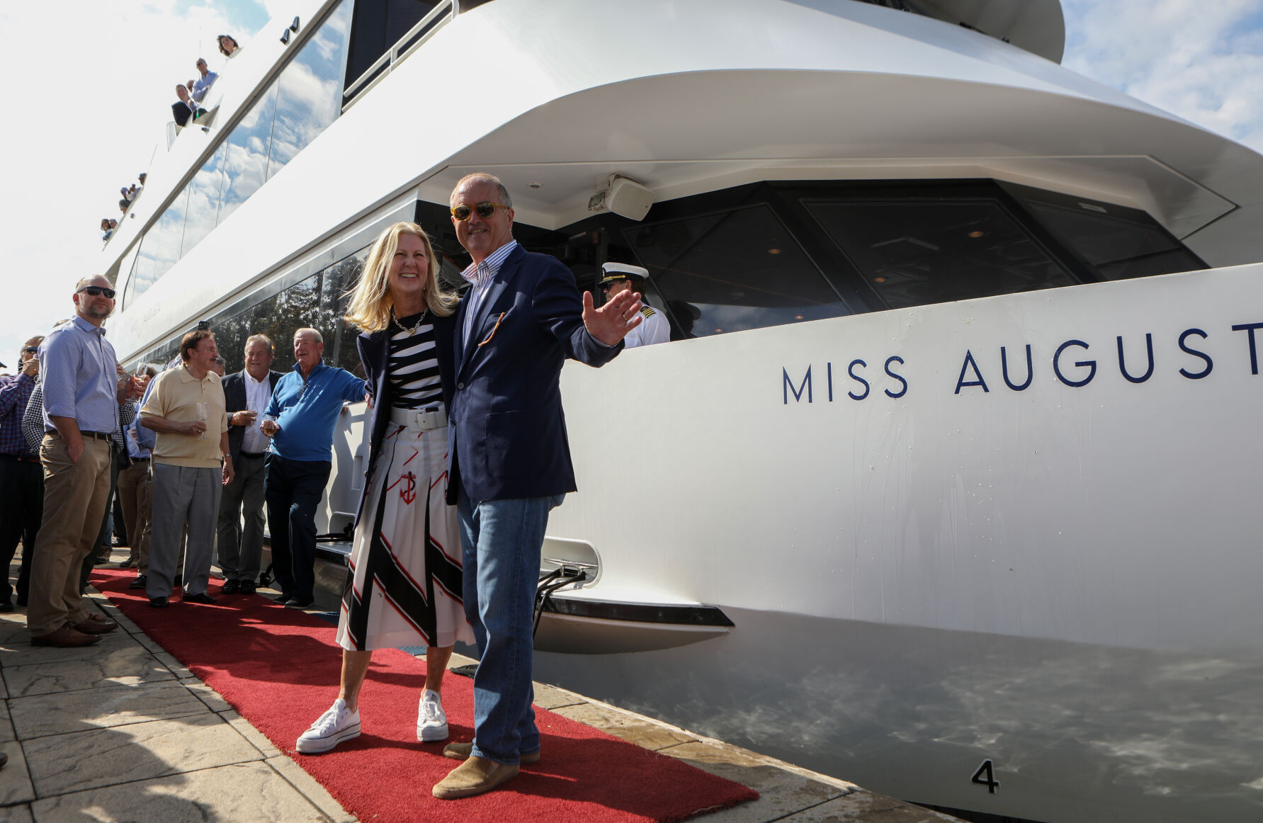 Jerri and David Hoffmann stand before Miss Augusta